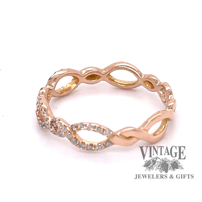 18 karat rose gold diamond openwork band ring, side view