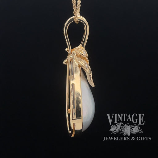 Mabe' pearl and diamond 14ky gold pendant side