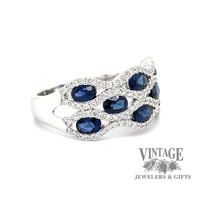 14 karat white gold Blue sapphire and diamond band ring, angled view
