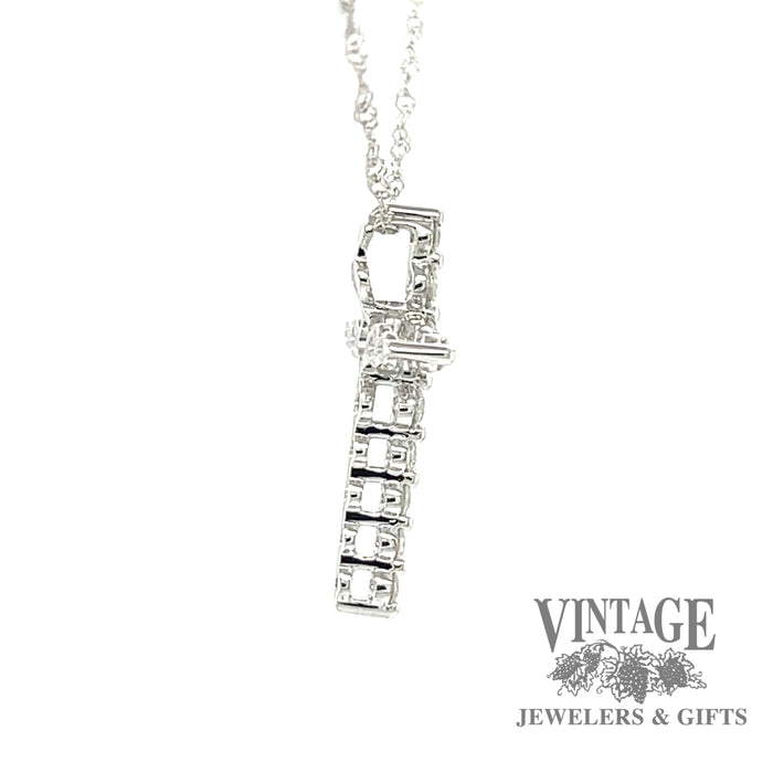 Diamond “bubble” 14ky gold cross necklace side