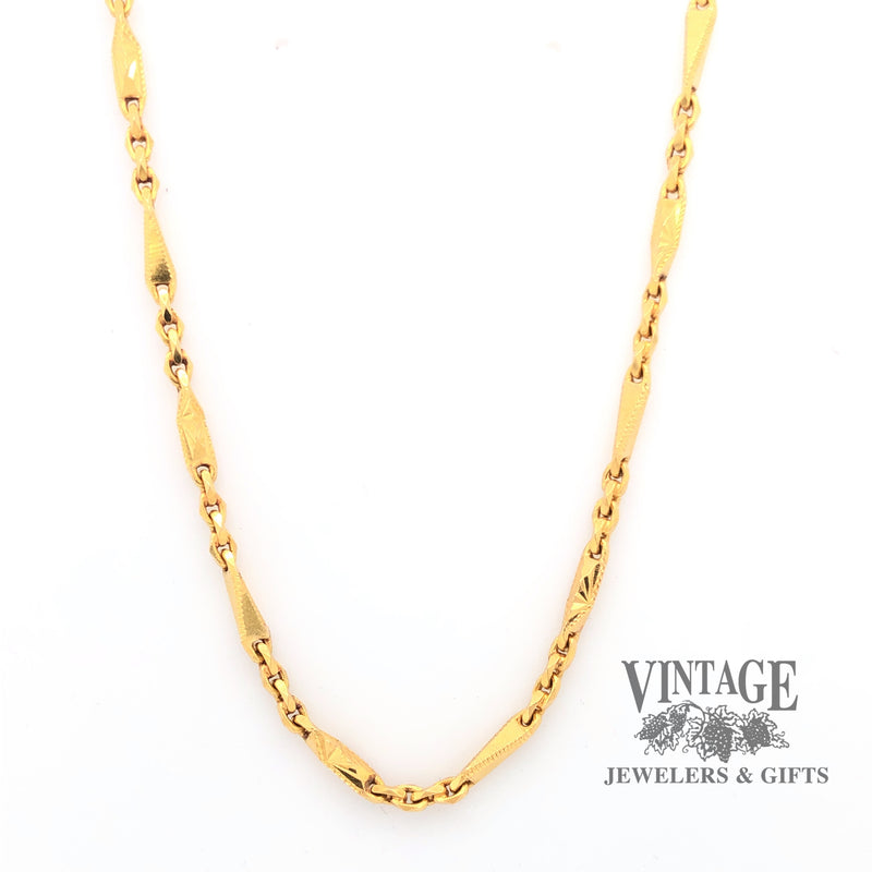 Front hanging view of 22 karat yellow gold fancy link 16.5" chain.
