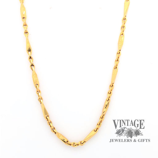 Front hanging view of 22 karat yellow gold fancy link 16.5" chain.