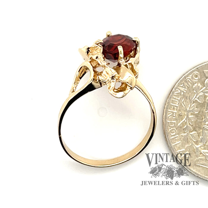 14 karat yellow gold 1.70ct oval garnet freeform ring, shown with quarter for size reference