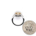 14 karat two tone .50ct vintage inspired diamond cluster ring, shown with quarter for size reference