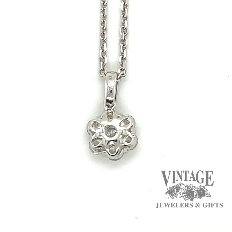 White gold 7 diamond cluster pendant.