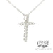 Diamond “bubble” 14ky gold cross necklace angle