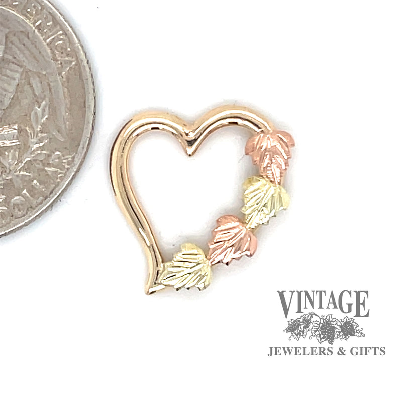 Black Hills Gold floating heart charm quarter for scale