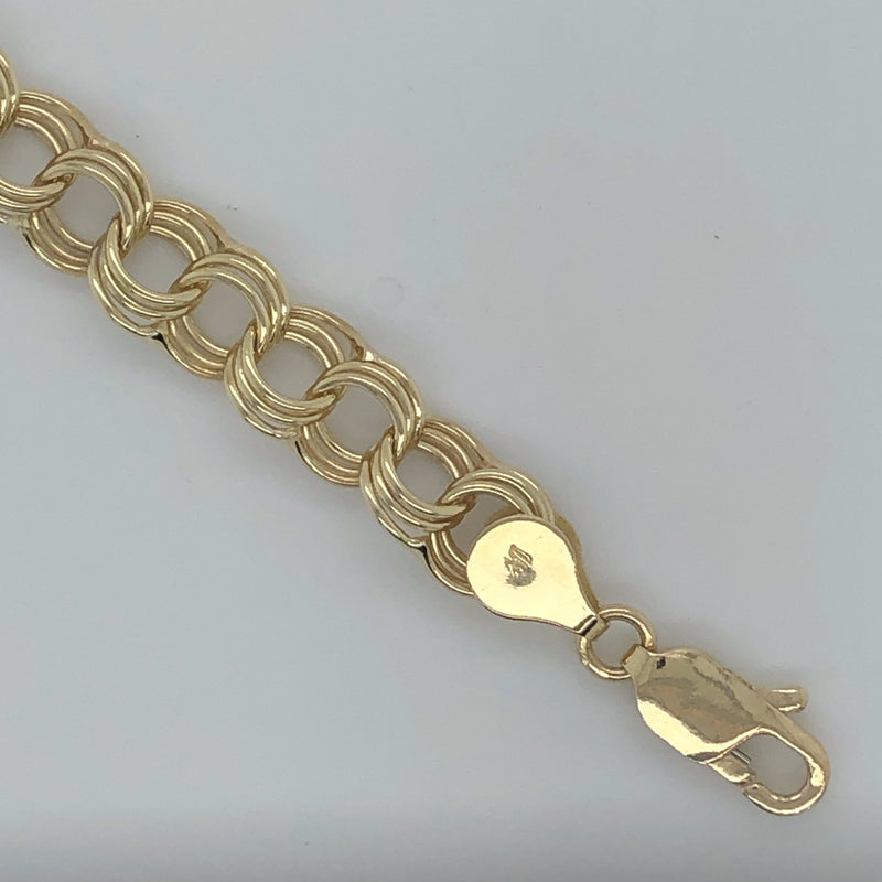 Yellow gold triple link charm bracelet