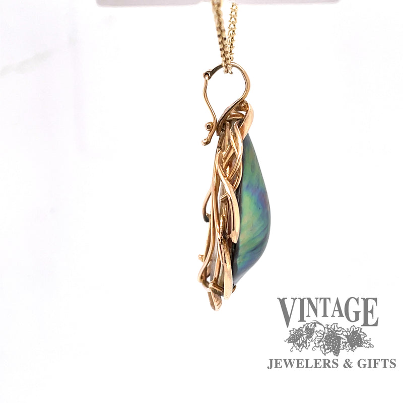 side view of 14 karat yellow gold abalone pearl enhancer pendant