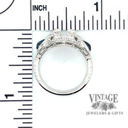 Edwardian inspired hand engraved cabochon sapphire and diamond 14kw gold ring scale