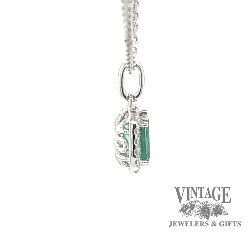 14 karat white gold .76ct Teal green tourmaline and diamond halo pendant, side view