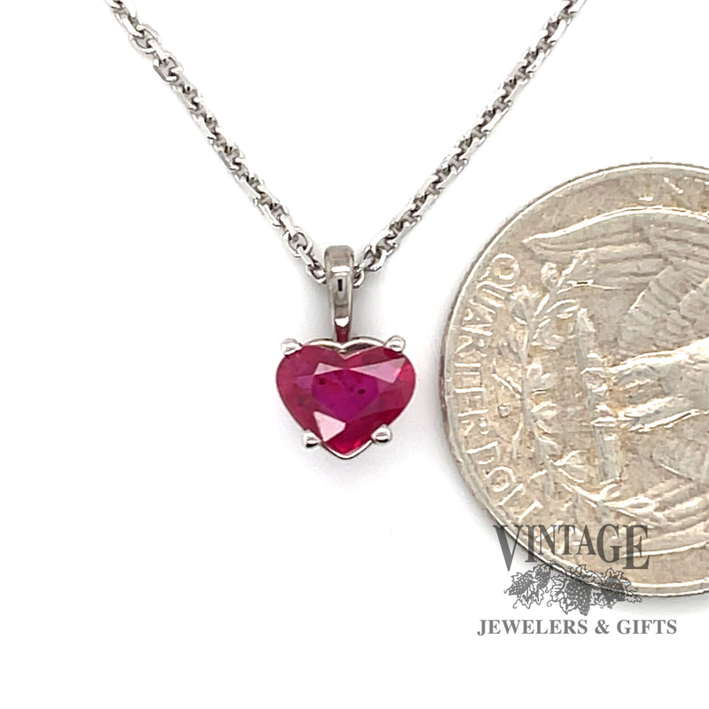 14 karat white gold 1.15ct heart shape natural ruby pendant, shown with quarter for size reference