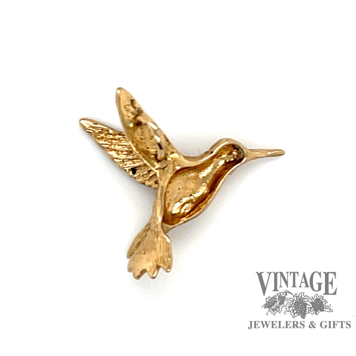 Small 14 karat yellow gold hummingbird charm or pendant, back