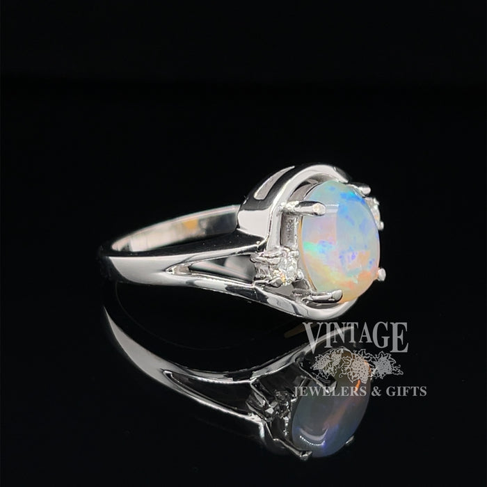 Crystal opal ring in white gold with diamonds angle