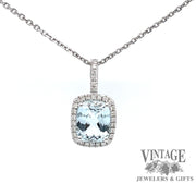 14 karat  white gold aquamarine with diamond halo pendant, front