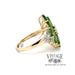 14 karat yellow gold Tsavorite garnet marquise cluster ring with accent diamonds, side view