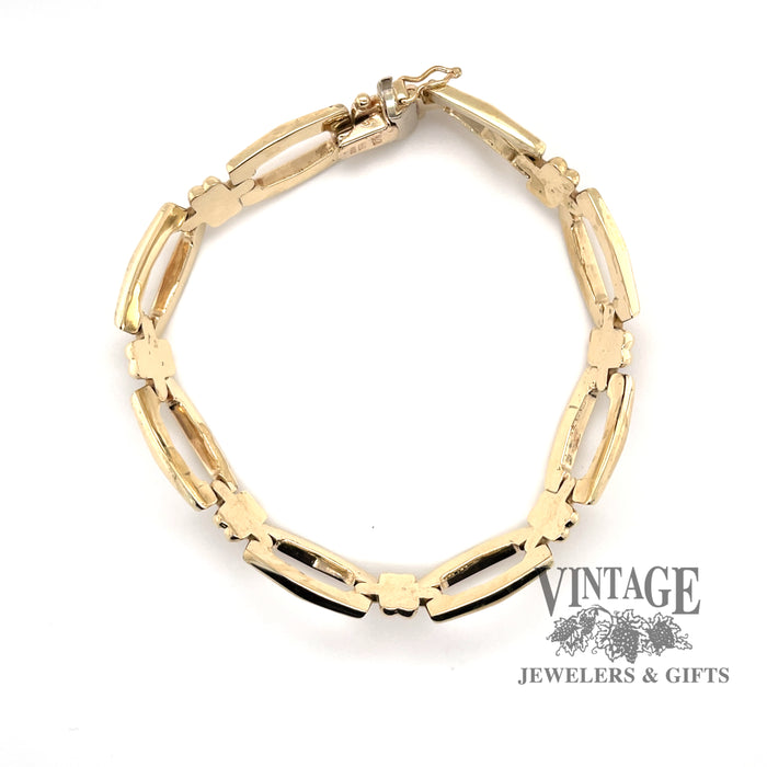 14 karat yellow gold elongated hollow link bracelet, side  view