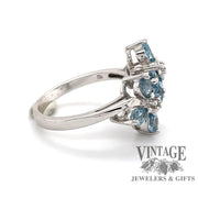 14 karat white gold pear shaped aquamarine flower ring, side view