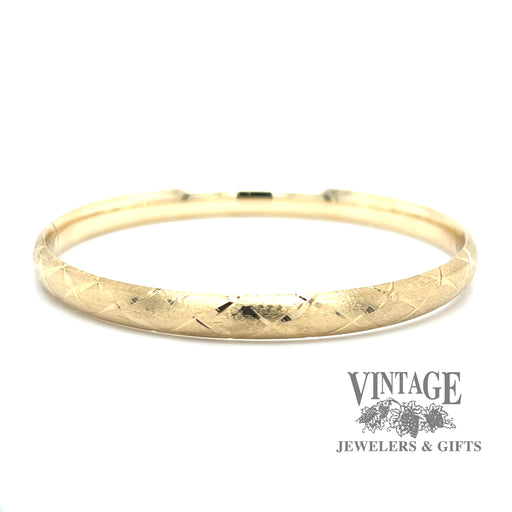 Hinged 14ky gold argyle pattern bangle bracelet