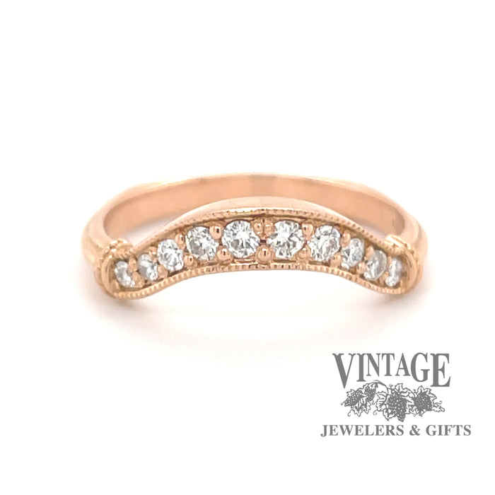 14K rose gold curved diamond wedding band, front view.