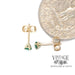 14 karat yellow gold .24ctw emerald martini stud earrings with quarter for scale