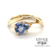 1.30ct Pear shape blue sapphire contemporary 14ky ring top