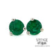 14 karat white gold .20 carat total weight emerald martini stud earrings