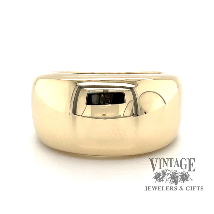 14 karat yellow gold wide domed and tapered band