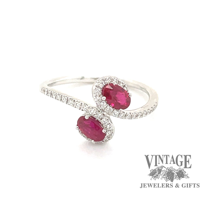 14 karat white gold .68ctw 2-ruby and diamond bypass ring