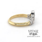 Platinum and 18 karat yellow gold crown design diamond band, side view