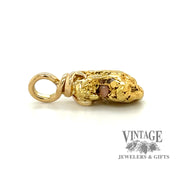 Natural gold nugget pendant side showing embedded quartz