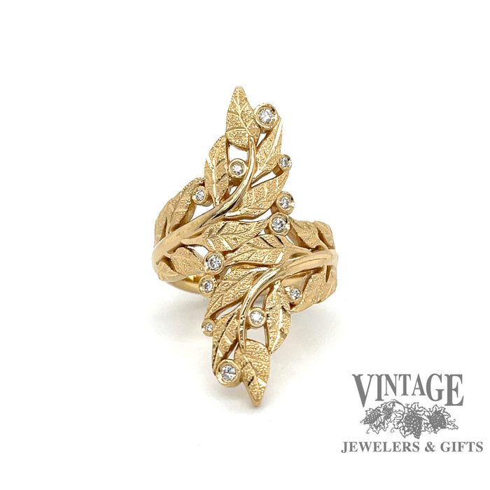Leaf motif and diamond 18k gold bypass ring,  front view