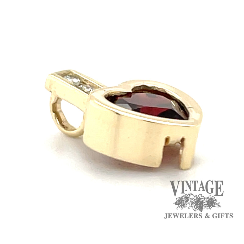 Heart shaped garnet and channel set pendant angle