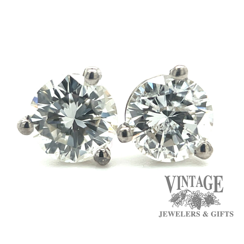 .65 carat 14kw gold diamond stud earrings close up