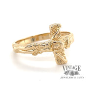14 karat yellow gold crucifix ring, angled view