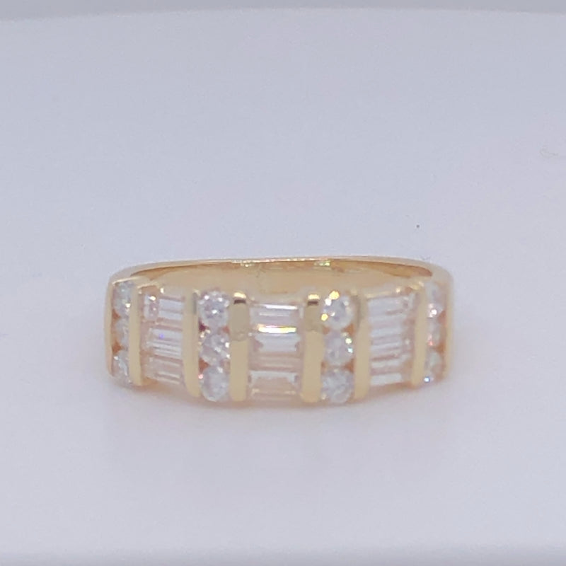 Yellow gold baguette with round diamonds wedding band.