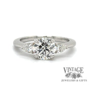 Platinum 1.28ctw round and pear-shape 3-diamond ring