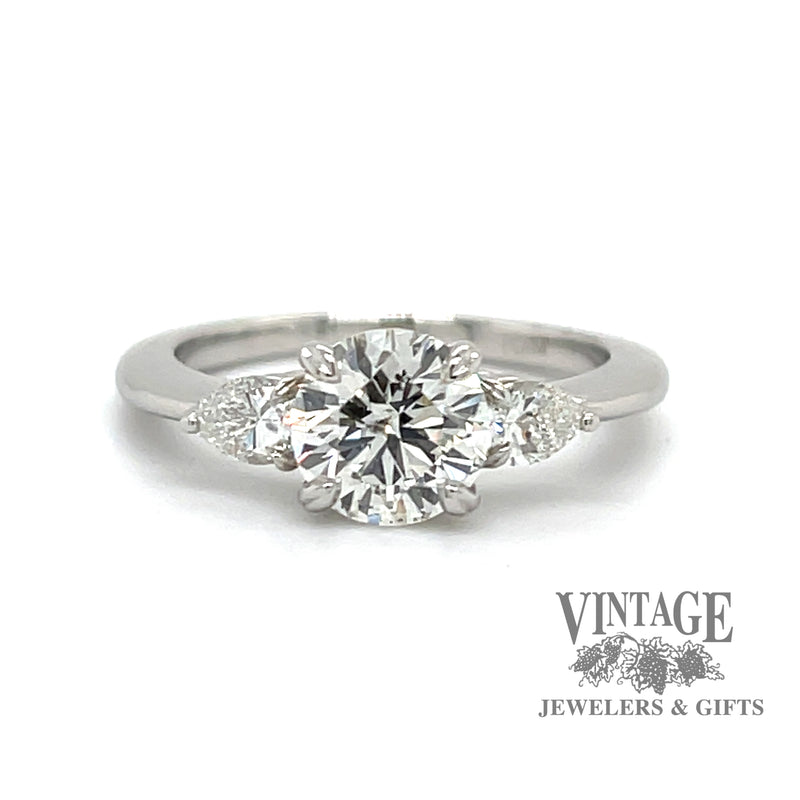 Platinum 1.28ctw round and pear-shape 3-diamond ring