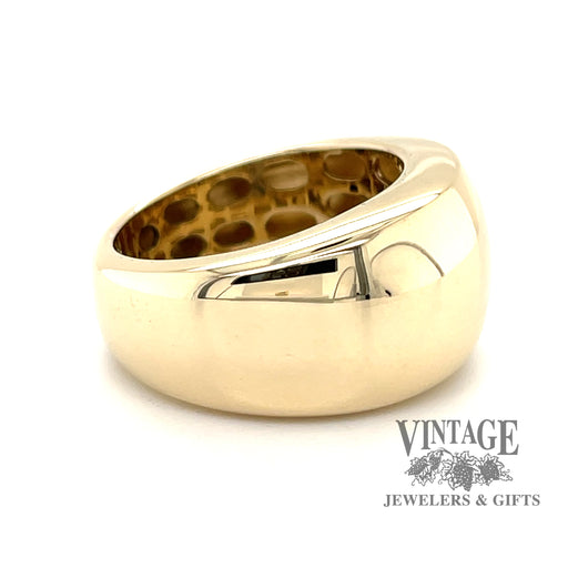14 karat yellow gold wide domed and tapered band, side view