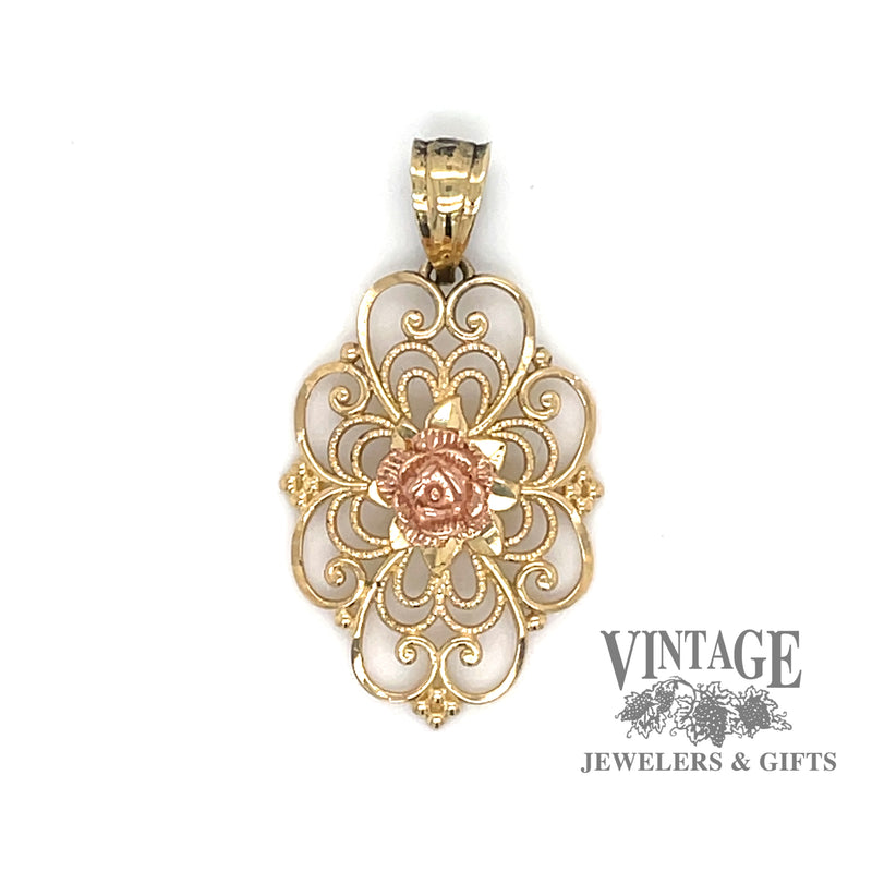 14 karat yellow gold filigree and rose pendant