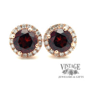 Garnet and diamond 14kr gold halo stud earrings close up