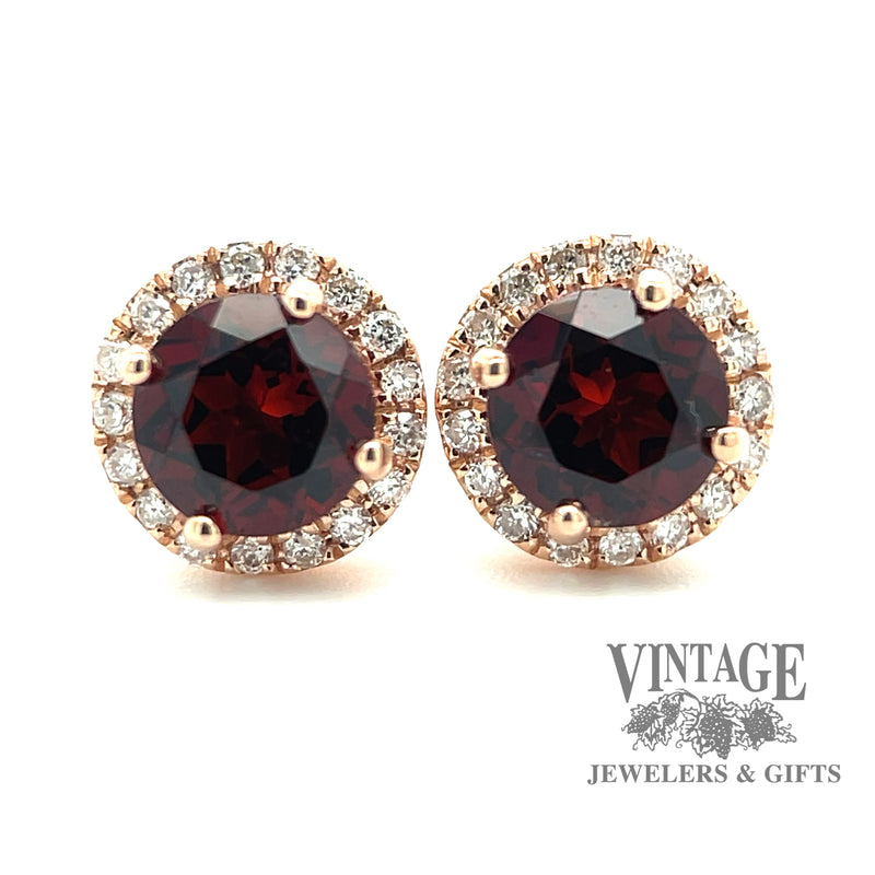 Garnet and diamond 14kr gold halo stud earrings close up