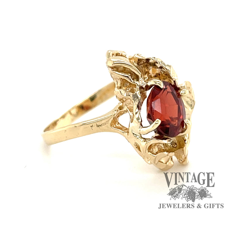 14 karat yellow gold 1.70ct oval garnet freeform ring, angled view