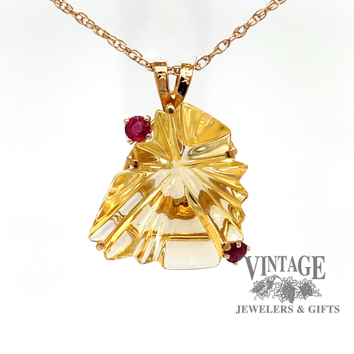 Fantasy cut citrine and ruby 18ky gold pendant suspended
