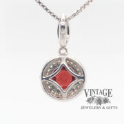 14 karat white gold 1.5 carat garnet and diamond halo pendant, back view