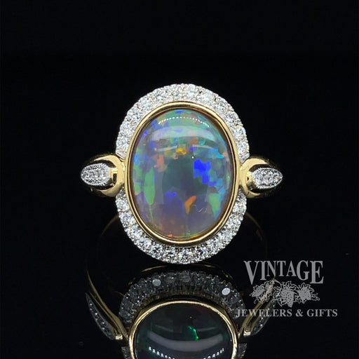Black opal and diamond 14ky gold ring