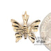 Diamond cut butterfly 14ky gold charm quarter for scale
