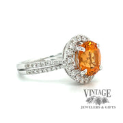 18 karat white gold 3.56 carat mandarin garnet and diamond ring, angled