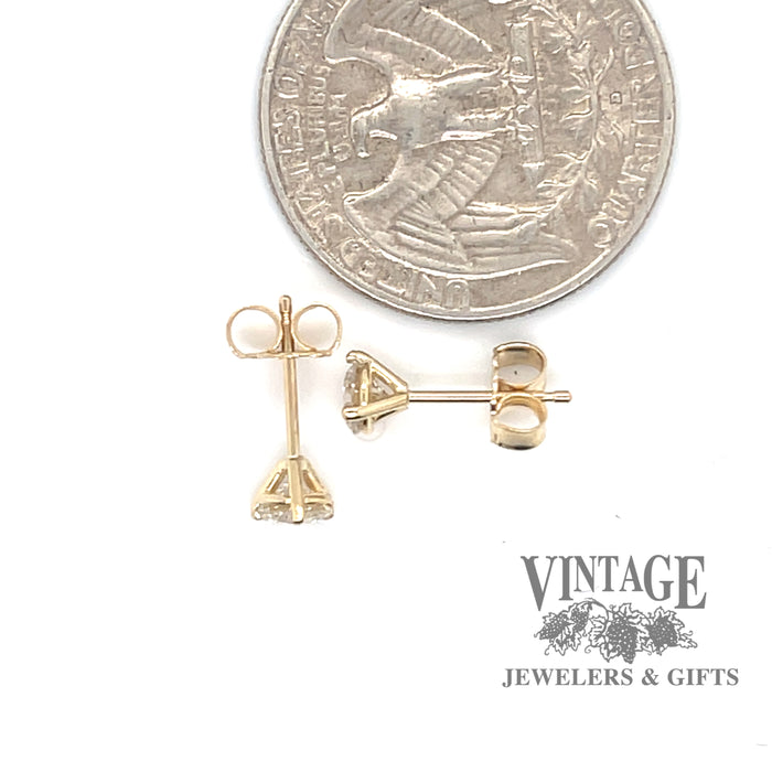 .63 carat 14ky gold diamond stud earrings quarter for scale