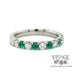 Emerald and diamond pave platinum ring angle